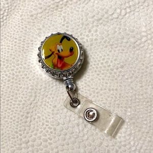 Pluto the pup ID badge reel Disney dog character